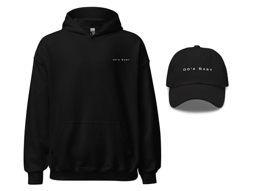 A black hoodie with text on the front and a matching black dad hat with embroidered text "2000's baby".