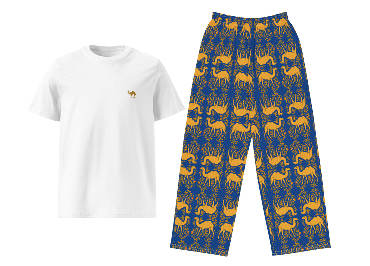 White t-shirt with a small camel and blue pants with camel pattern on a white background