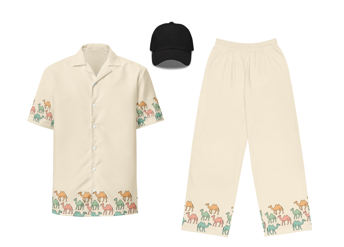 Beige shirt and pants with camel pattern and black cap on a white background