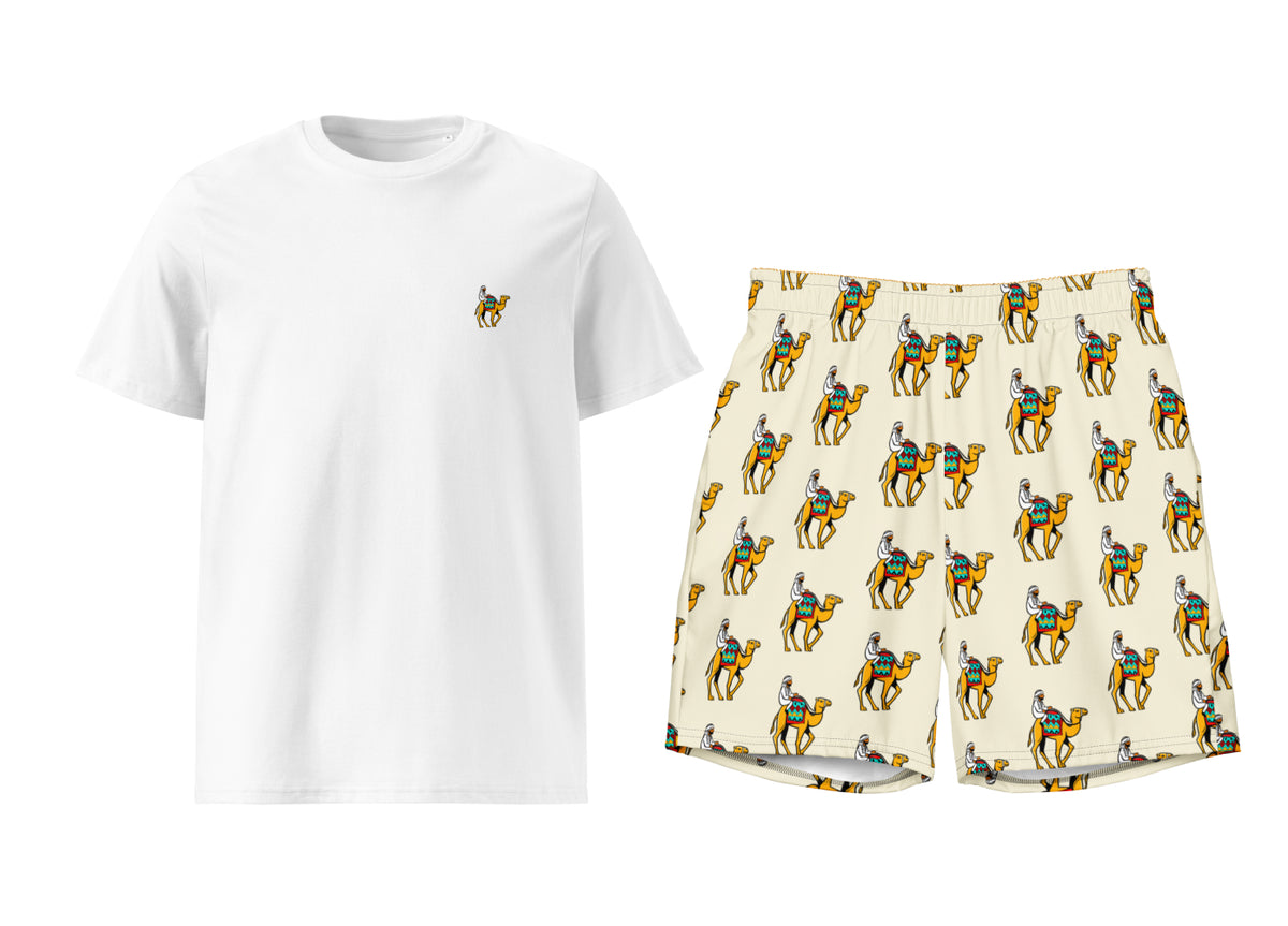 White t-shirt with a small camel rider and patterned shorts on a white background