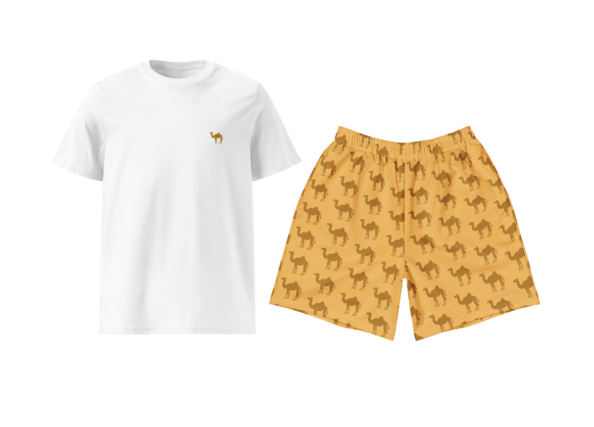White t-shirt with a small logo and yellow shorts with camel pattern on a white background