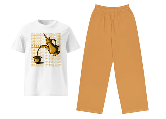 White t-shirt with coffee-themed design and mustard yellow pants on a white background