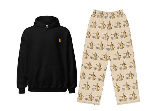 Black hoodie with a Dallat Gahwa and Dallat Gahwa and Finjan patterned beige pants on a white background