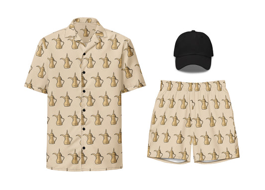 A set of apparel featuring a beige button shirt with dallat gahwa patterns, black swim trunks with the same pattern, and a black embroidered dad hat.