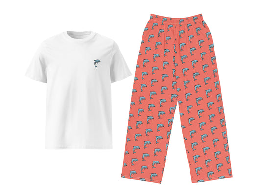 White t-shirt with a small dolphin and pink patterned pants on a white background