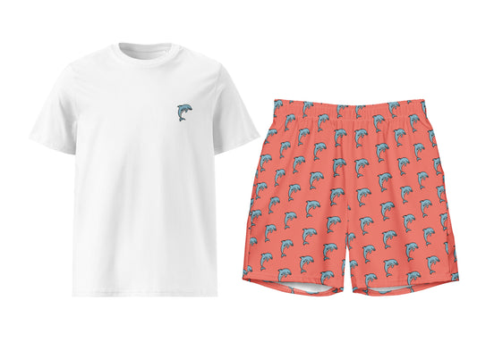 White t-shirt and coral shorts with dolphin pattern on a white background
