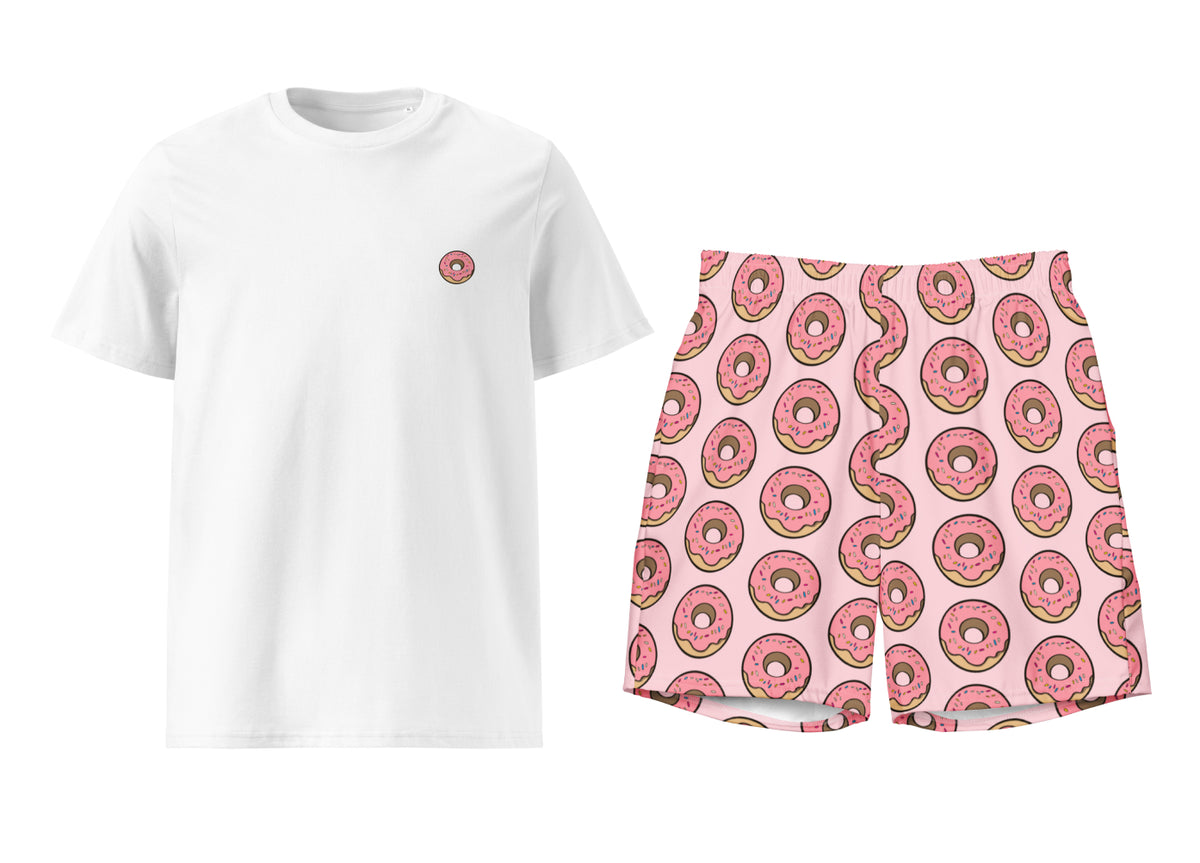 White t-shirt with a small donut print and pink shorts with donut pattern on a white background