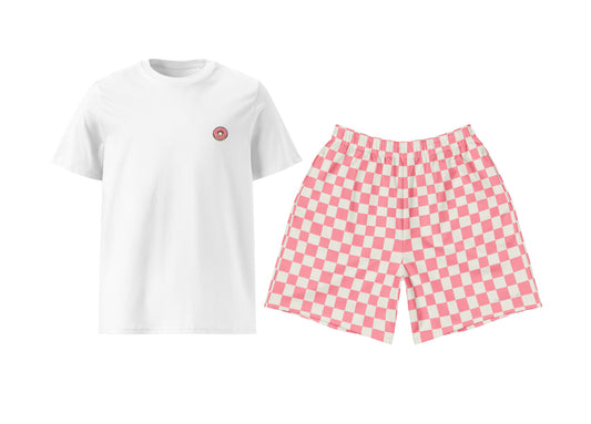 White t-shirt with a small donut print and pink checkered shorts on a white background