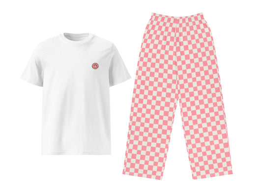 White t-shirt with a small donut print and pink checkered pants on a white background