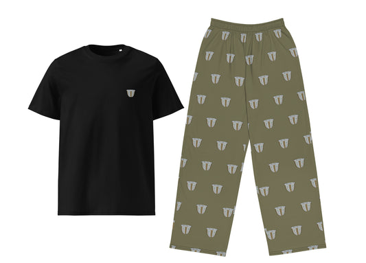 Black t-shirt and green patterned pants on a white background