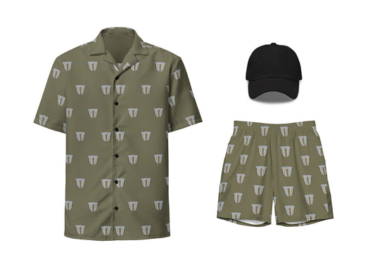 A set of adult apparel including a button shirt and swim trunks in khaki with a finjan pattern, and a black embroidered dad hat.