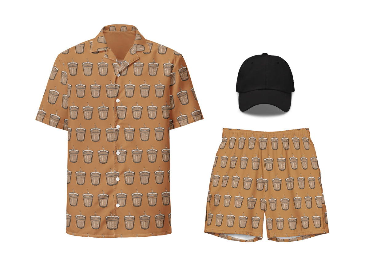 A set of beige-colored apparel featuring a coffee cup pattern, including a unisex button shirt, swim trunks, and a dad hat.