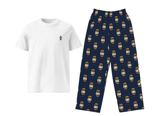 White t-shirt with a small lantern and navy pants with gold lantern pattern on a white background