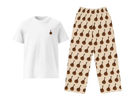 White t-shirt with a small graphic and beige pants with oud pattern on a white background