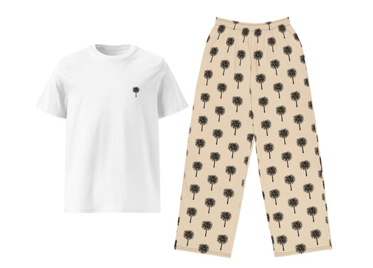 White t-shirt with black palm tree design and beige pants with black palm tree pattern on a white background