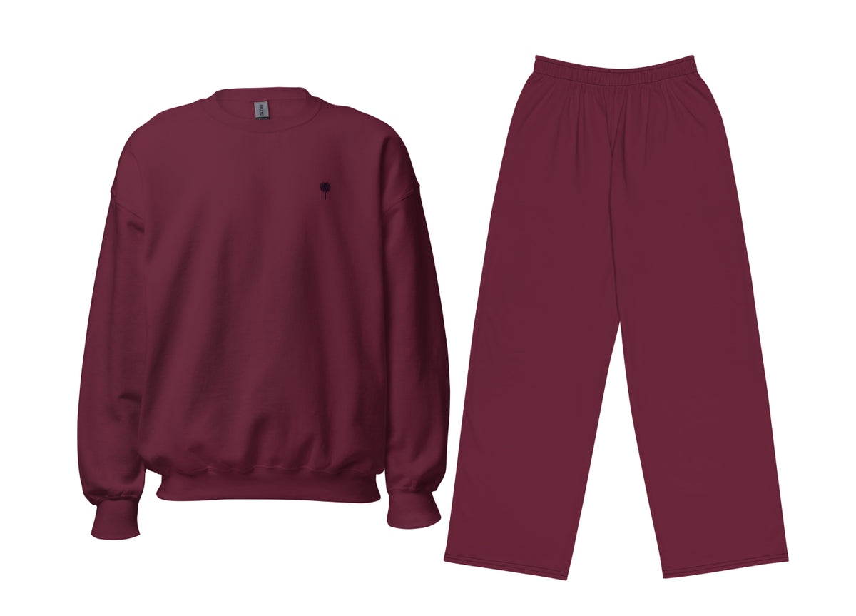 Maroon sweatshirt and pants set on a white background