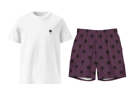 White t-shirt with a small black design and purple shorts with black palm tree pattern on a white background