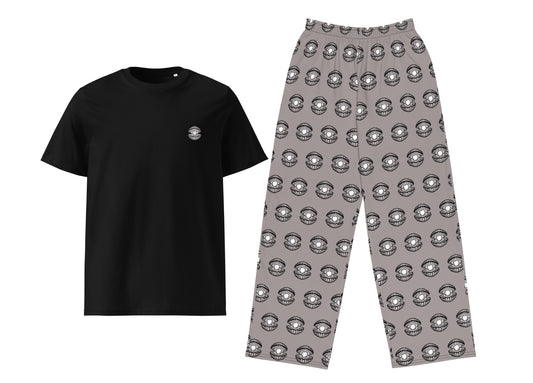 Black t-shirt and gray patterned pants on a white background