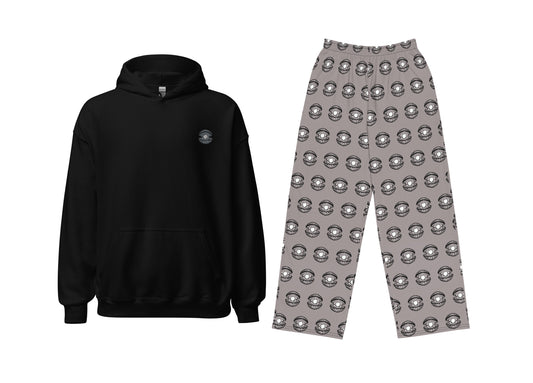 Black hoodie and patterned gray pants on a white background