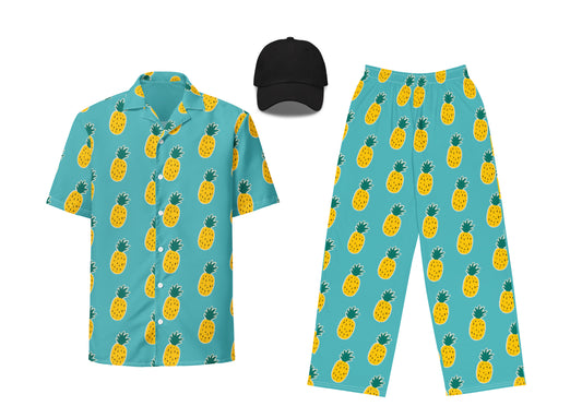 Set of pineapple-patterned shirt, pants, and cap on a white background