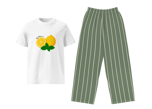 White t-shirt with lemon graphic and green pinstripe pants on a white background