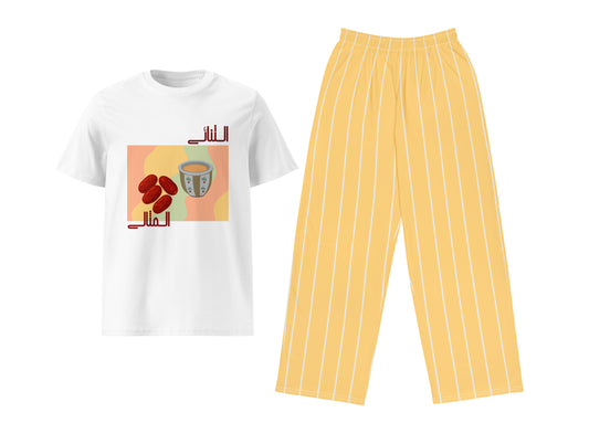 White t-shirt with graphic design and yellow striped pants on a white background