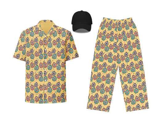 Colorful patterned shirt, pants, and cap on a white background