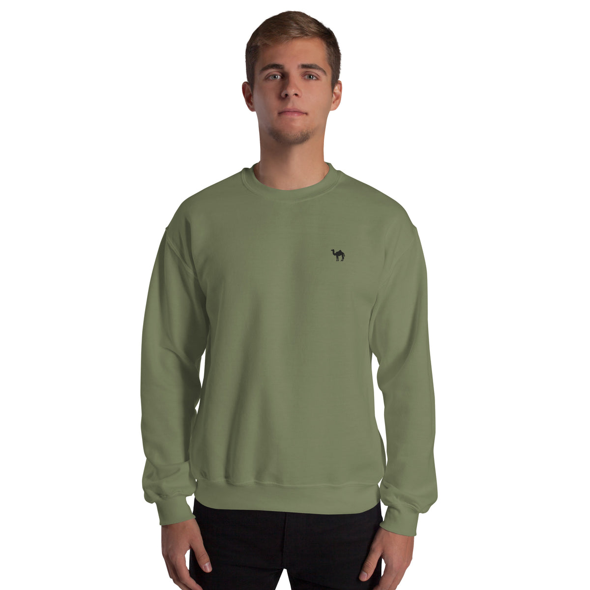 Person wearing a green sweatshirt with a small black camel embroidery on a white background
