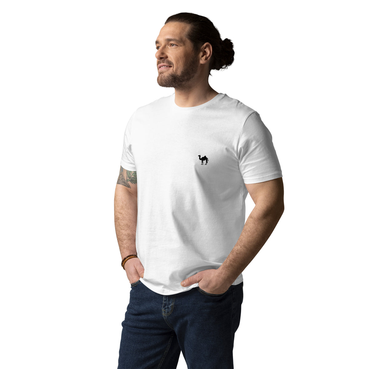 Man wearing a white t-shirt with a small black camel print on a white background