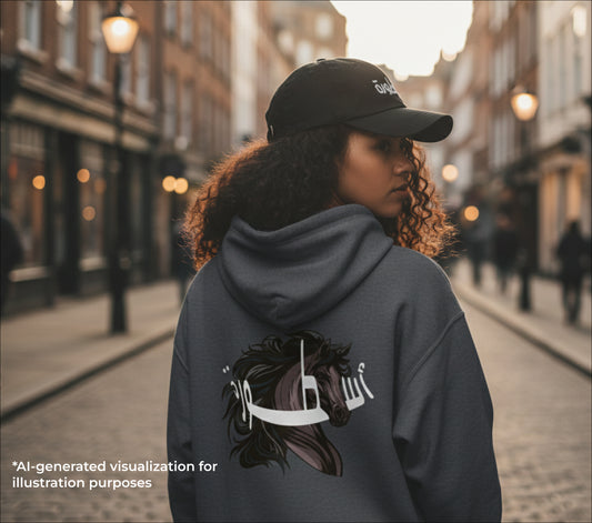 Person wearing a hoodie with a horse design on a city street