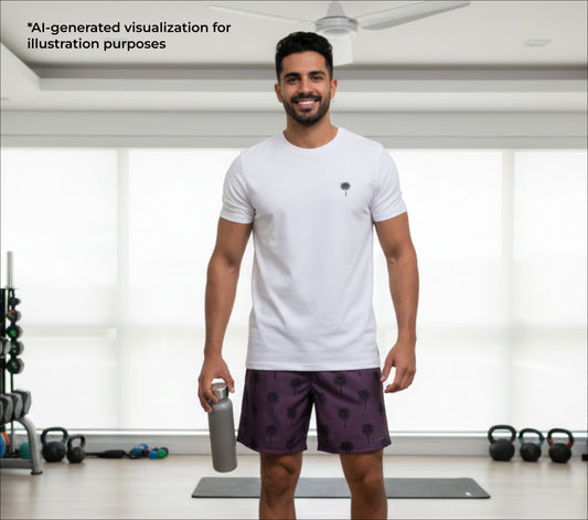 Man in a gym holding a water bottle.