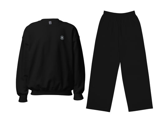 Black sweatshirt and pants set on a white background