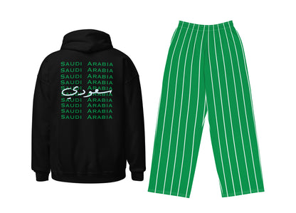 Black hoodie with 'Saudi Arabia' text and green pinstripe pants on a white background