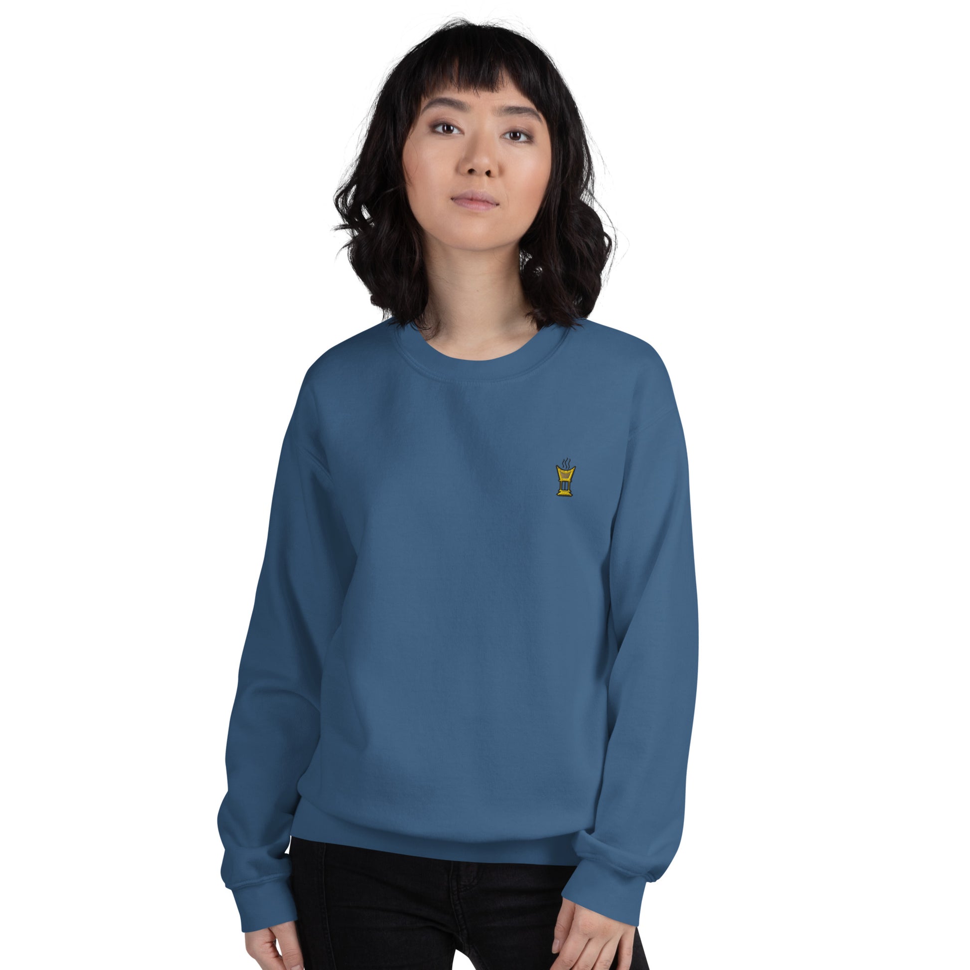 Person wearing a blue sweatshirt with text on a white background